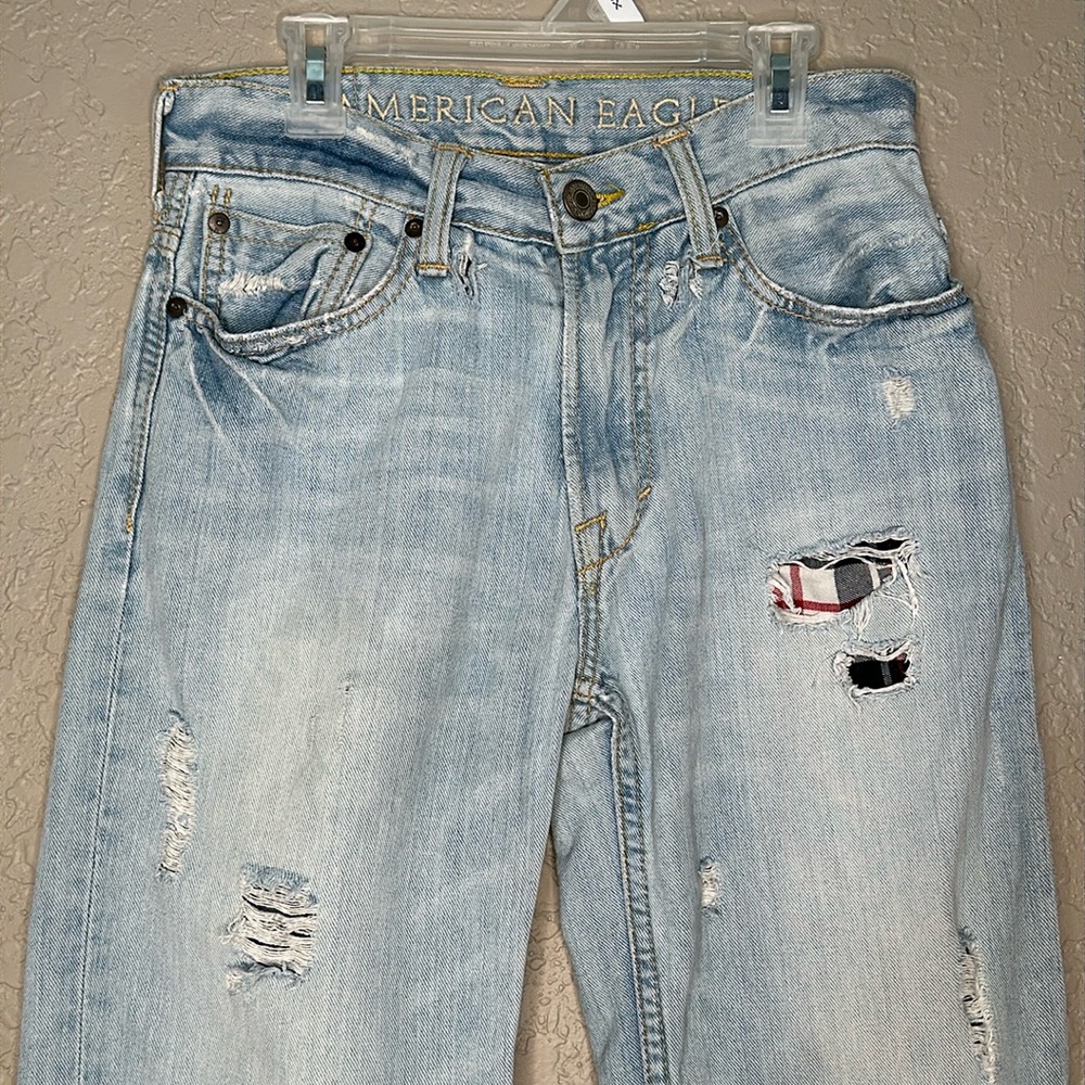 American Eagle low loose patched light wash jeans size 24/26